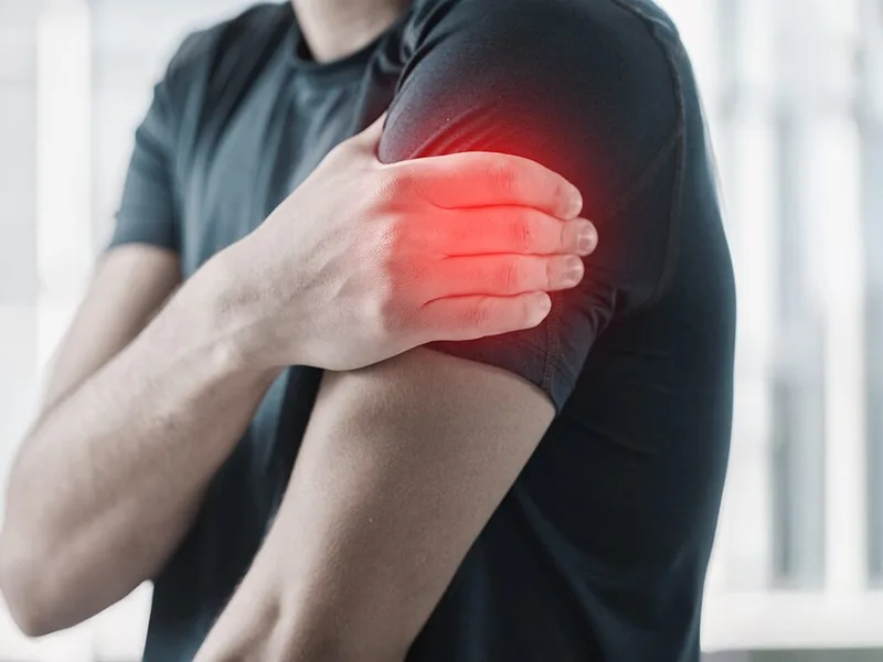 Rise Family Chiropractic treating arm pain in Hudsonville