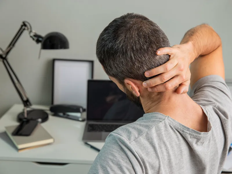 Rise Family Chiropractic treating neck pain in Hudsonville